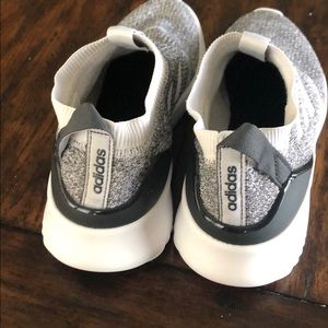 Size seven women’s Adidas slip on tennis shoes